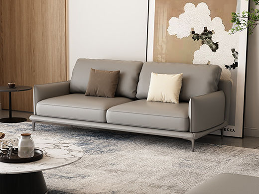 非凡工艺 现代简约 生态真皮+全实木内架+多层实木板+高回弹海绵+15分碳素钢五金脚 暖灰 皮艺沙发 2.2米三位+脚踏坐凳